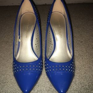 Blue high heel shoes. Christian Siriano